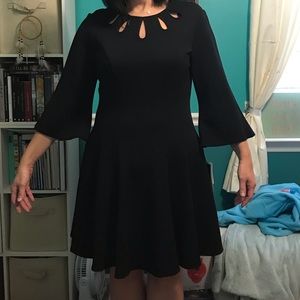 NWT Black midi dress with cutouts in the neck